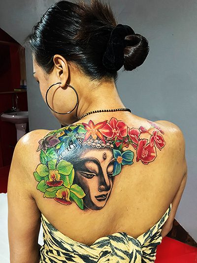 Buddha and flowers back piece Buddha and flowers back piece